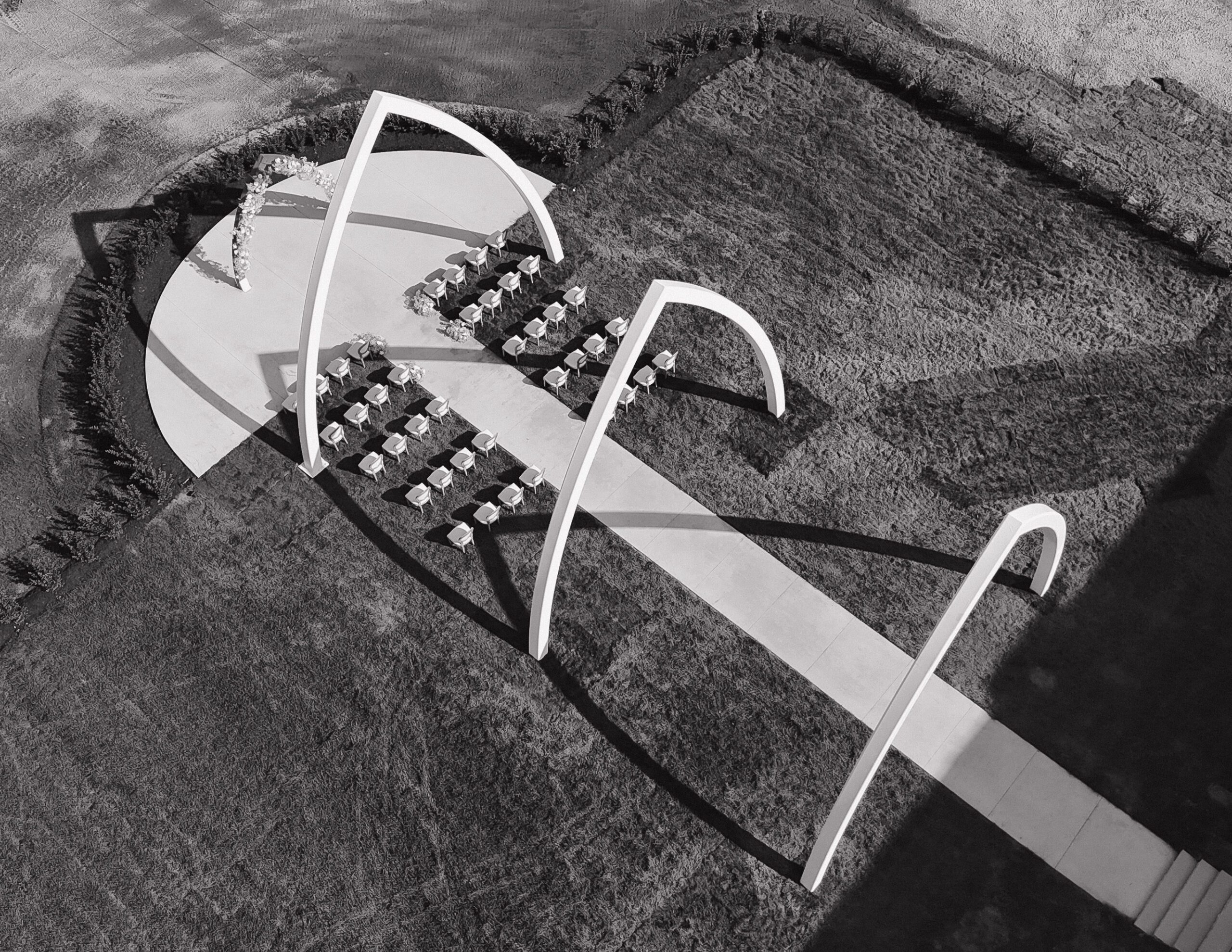 Black and white aerial photo of The Wells Estate’s grand ceremony arches in Avon, New York